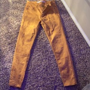 mustard colored pants.     NEVER BEEN WORN